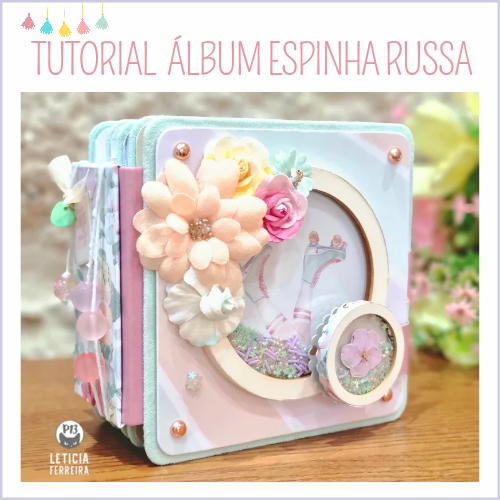 Álbum artesanal decorado com flores e janelas redondas em tons pastel