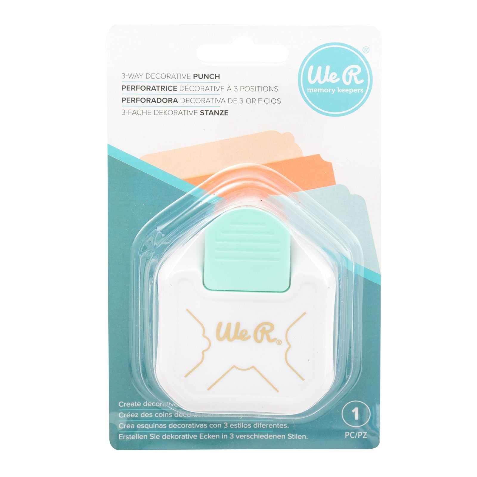 Furador decorativo de papel We R memory keepers em embalagem branca e verde-água.