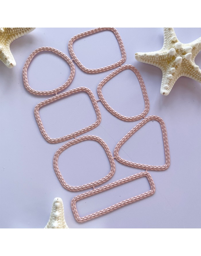 Elásticos de cabelo rosa com textura trançada e estrelas-do-mar