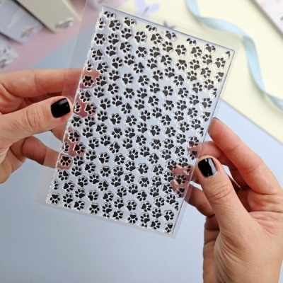 Carimbo transparente com padrão de patas de animal