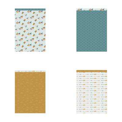Papel de presente com quatro padrões diferentes em folhas retangulares