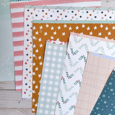 Folhas de papel decorativo com vários padrões e cores para artesanato