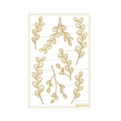 folhas decorativas bege e dourado numa folha branca