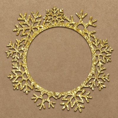 aro decorativo circular com flocos de neve dourados brilhantes sobre fundo castanho