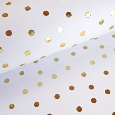 Papel de embrulho branco com bolinhas douradas