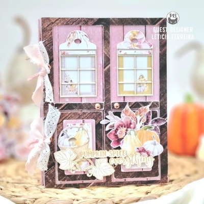 Caderno decorativo com capa preta e detalhes em tons pastel com tema de abóbora e flores