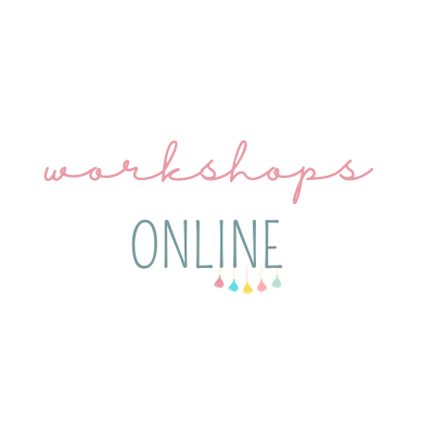 Texto 'workshops ONLINE' em fundo branco com pingentes coloridos