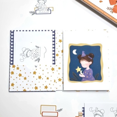 Conjunto de papelaria infantil com ilustrações de menina e estrelas em várias cores.