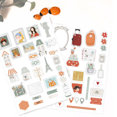 Dois conjuntos de autocolantes variados com joaninhas artificiais no topo