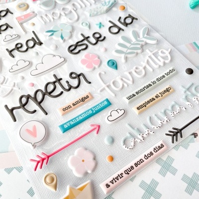 Folha de autocolantes com palavras e elementos gráficos decorativos em cores pastel e preto