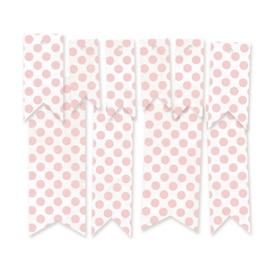 Fitas decorativas com bolinhas cor-de-rosa em fundo branco