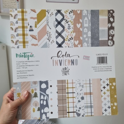 Conjunto de papéis estampados com padrões de inverno em tons neutros e pastel