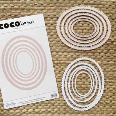 Conjunto de moldes ovais de metal brancos e rosa claro com acabamento recortado sobre suporte com texto COCO basic