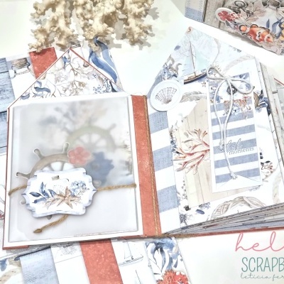 Álbum scrapbook com decoração náutica e papel vegetal translúcido na capa