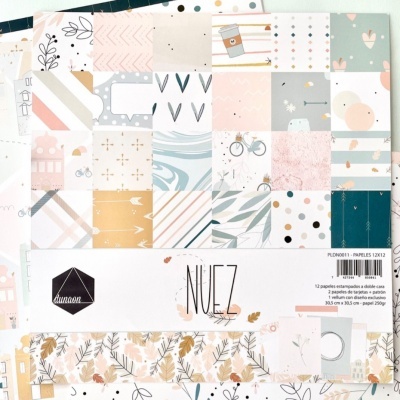 Conjunto de papéis estampados com padrões suaves e texturas variadas em tons pastel