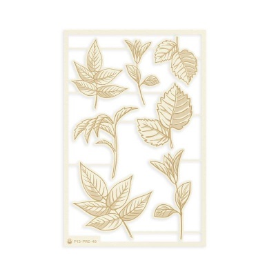 Moldes em PVC bege com formatos variados de folhas numa moldura branca