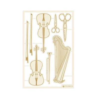 Recortes dourados com desenhos de instrumentos musicais e tesouras em fundo branco