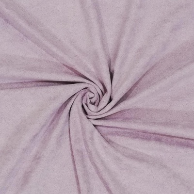 Tecido rosa claro com textura suave enrolado em padrão espiral