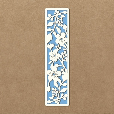 Marcador de livros azul com padrão floral branco