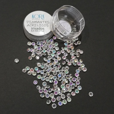 Frasco pequeno com brilhantes acrílicos irisados de 4,5 mm sobre fundo preto