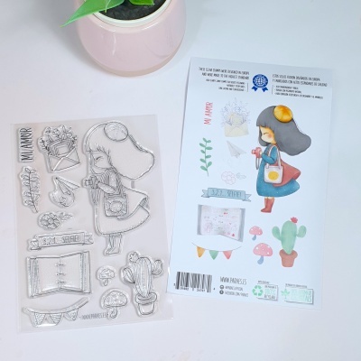 Conjunto de carimbos com figuras de menina e plantas, papel ilustrado e vaso rosa com planta