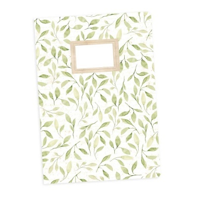 Caderno com capa branca e padrão de folhas verdes