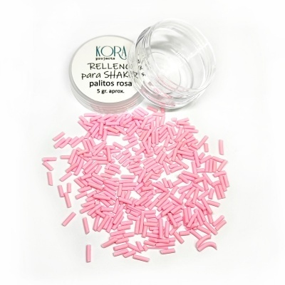 Recipiente transparente com tampa branca contendo palitos rosa pequenos para unhas.