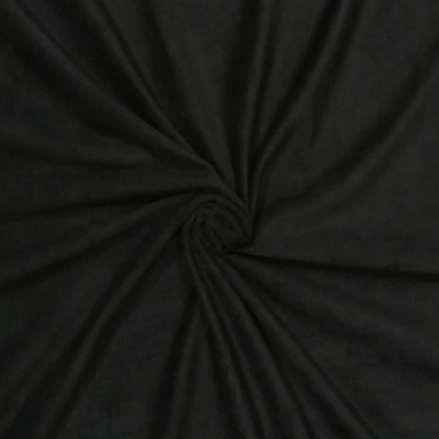 Tecido preto em espiral com textura suave