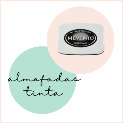 Almofada de tinta Memento preta com tampa branca em fundo com círculos coloridos e texto manuscrito