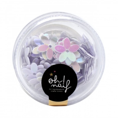 Frasco com flores decorativas iridescentes pastel e rótulo preto com texto