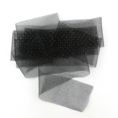 Tecido preto transparente com pequenos pontos dourados