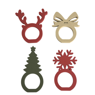 Anéis de guardanapo de madeira com formas natalícias em várias cores