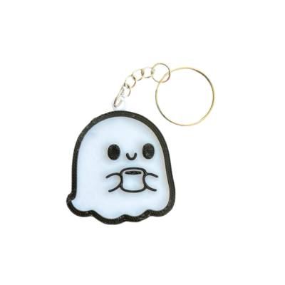 Porta-chaves fantasma branco com chávena e contorno preto.