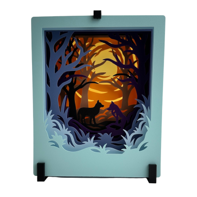 Quadro decorativo em camadas de papel com cães e bosque ao pôr do sol