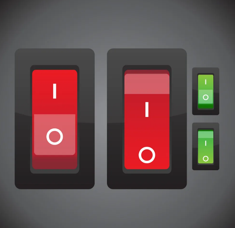 Quatro interruptores elétricos retangulares em vermelho e verde sobre fundo cinzento