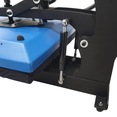 Prensa térmica preta com almofada azul e amortecedores metálicos