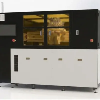 Máquina industrial preta e branca com portas de vidro amarelo e botões vermelhos