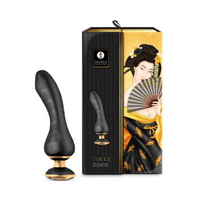 Plug anal preto com base dourada ao lado da embalagem decorada com mulher oriental