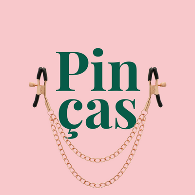 Pinças metálicas douradas com pontas pretas e correntes douradas em fundo cor-de-rosa