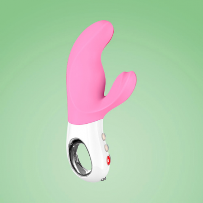 Vibrador rosa com pega branca e botões, fundo verde
