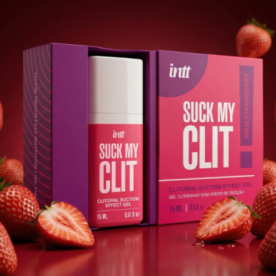 Frasco e embalagem do gel SUCK MY CLIT ao lado de morangos frescos