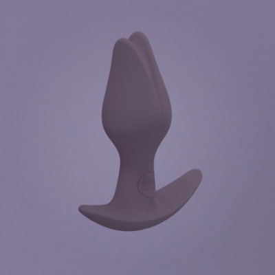 Plug anal roxo de silicone com base larga e texto 'FUN FACTORY' numa base circular