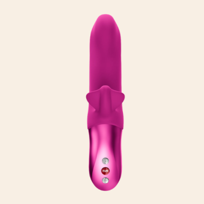 Vibrador roxo em silicone com base metálica rosa e botões em fundo bege