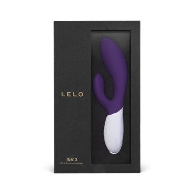 Vibrador roxo e branco em embalagem preta com texto LELO