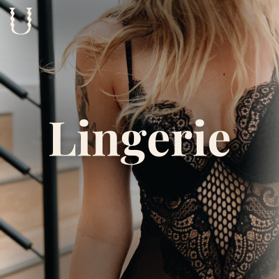 Roupa interior feminina em renda preta com padrão floral e malha