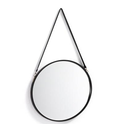 Espelho redondo com moldura preta e correia preta pendurado na parede