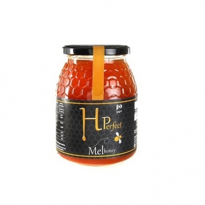 Frasco de mel com rótulo preto e tampa preta