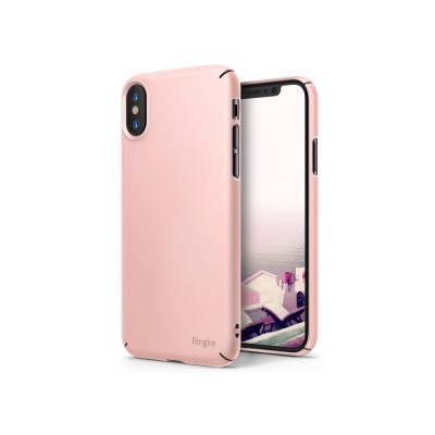 Telemóvel com estojo rosa claro e ecrã com imagem de paisagem costeira