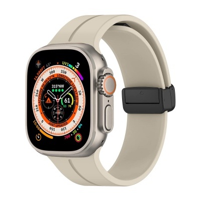 Smartwatch com bracelete creme e mostrador colorido em fundo branco