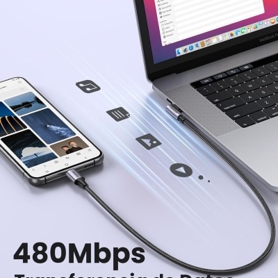 Cabo USB preto conectando smartphone a portátil com texto sobre transferência de dados.